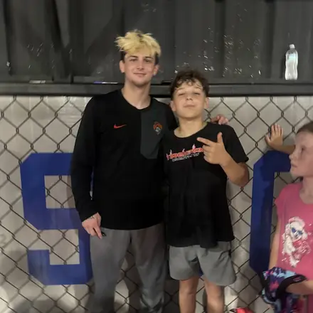 Two AWC teammates at a tournament venue.
