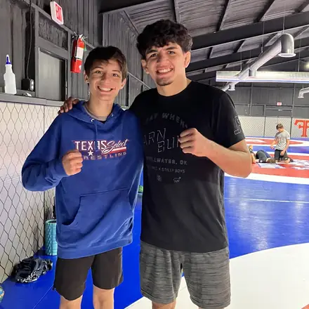 Two AWC teammates together after a match.