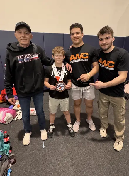 AWC medalists with their coaches at the end of a tournament day